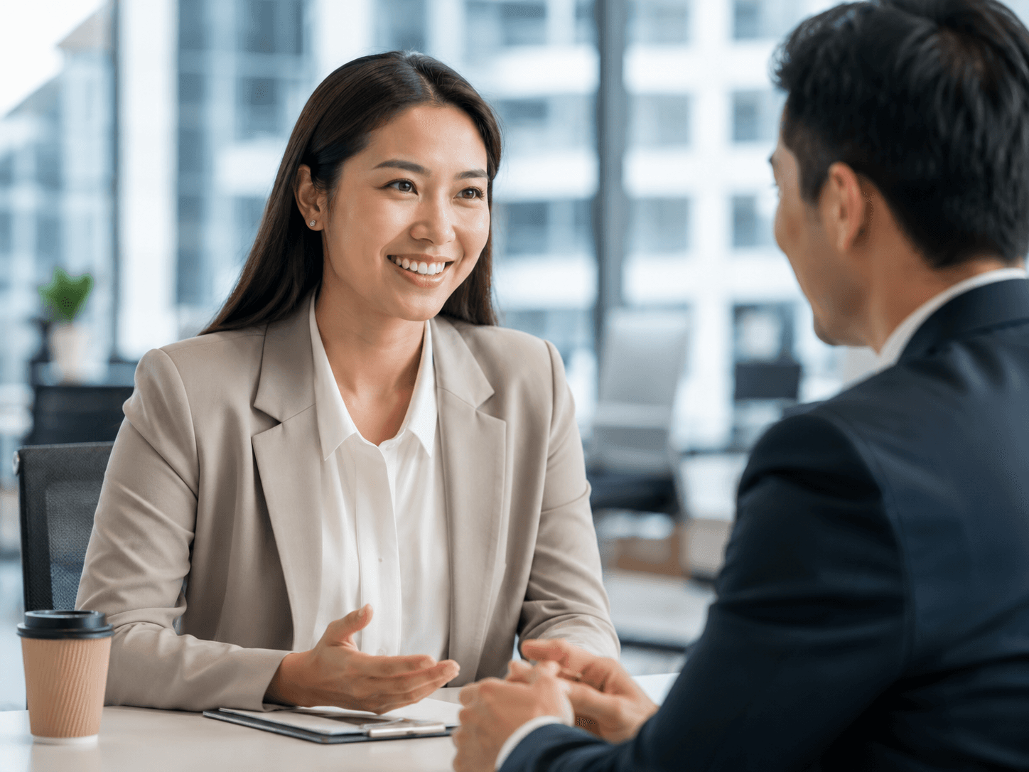 Recruiter and client reviewing benchmark evidence